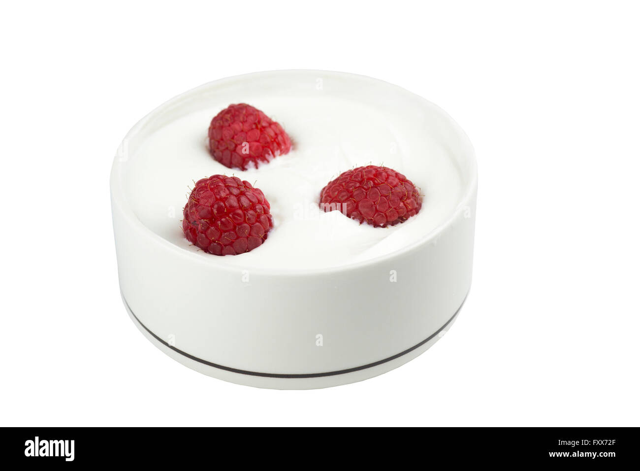 Ciotola di yogurt greco con lamponi Foto Stock