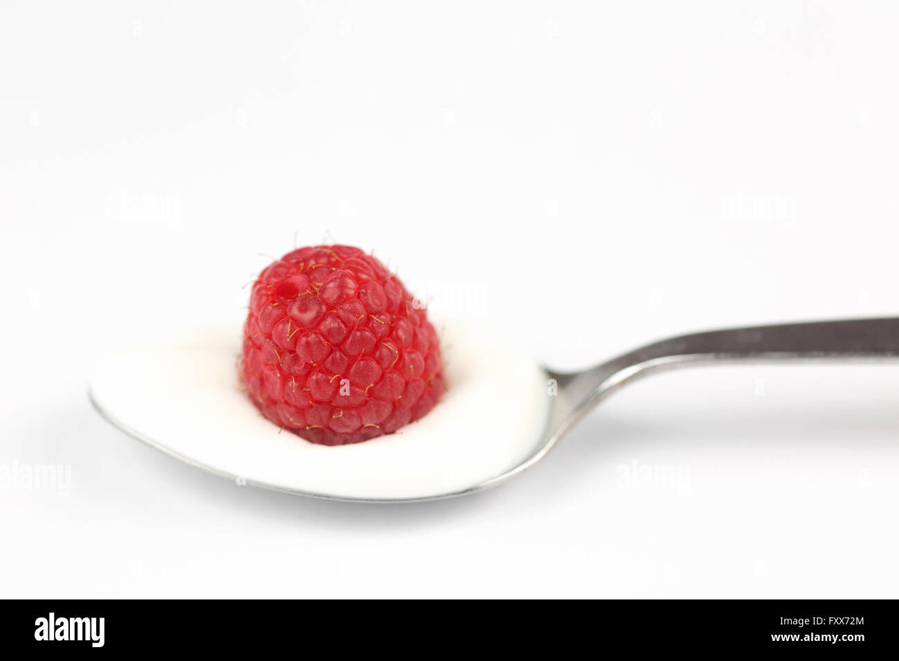 1 cucchiaio di yogurt greco con lampone Foto Stock