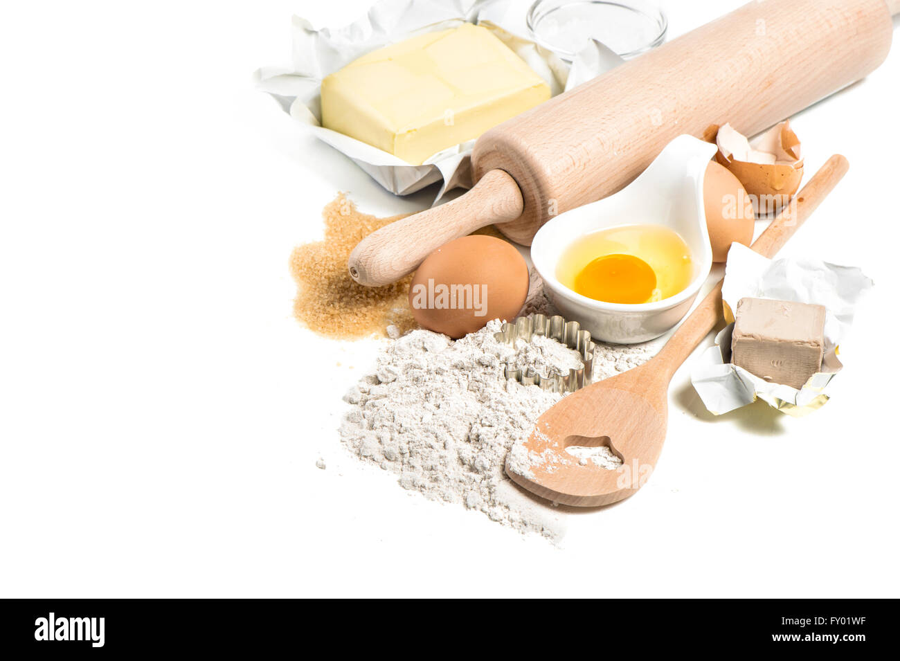 La farina in un barattolo di vetro con il mattarello e covoni di grano Foto  stock - Alamy