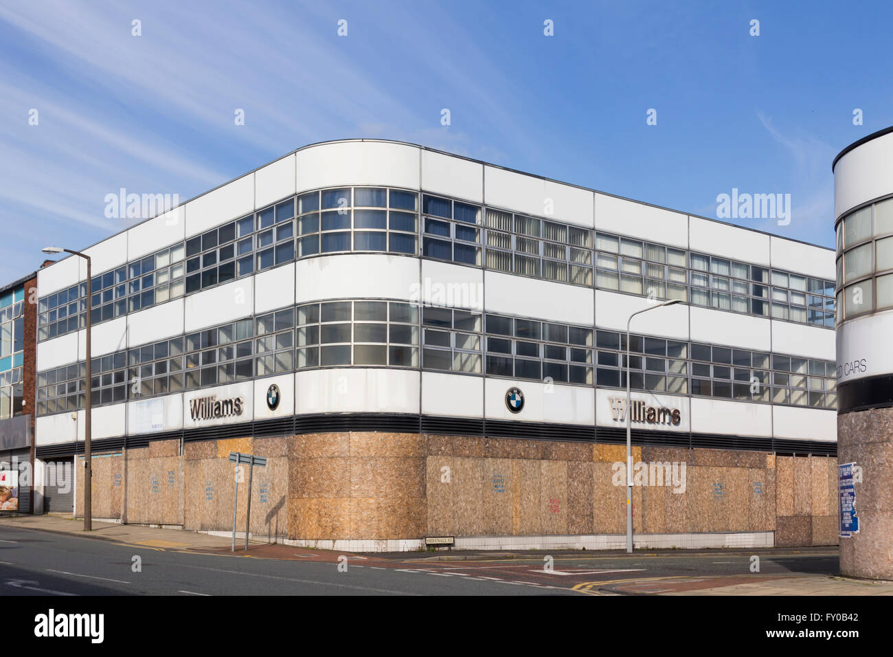 Parte dei locali della ex Williams BMW concessionaria su Bradshawgate sul bordo del centro di Bolton,, ora chiusa. Foto Stock