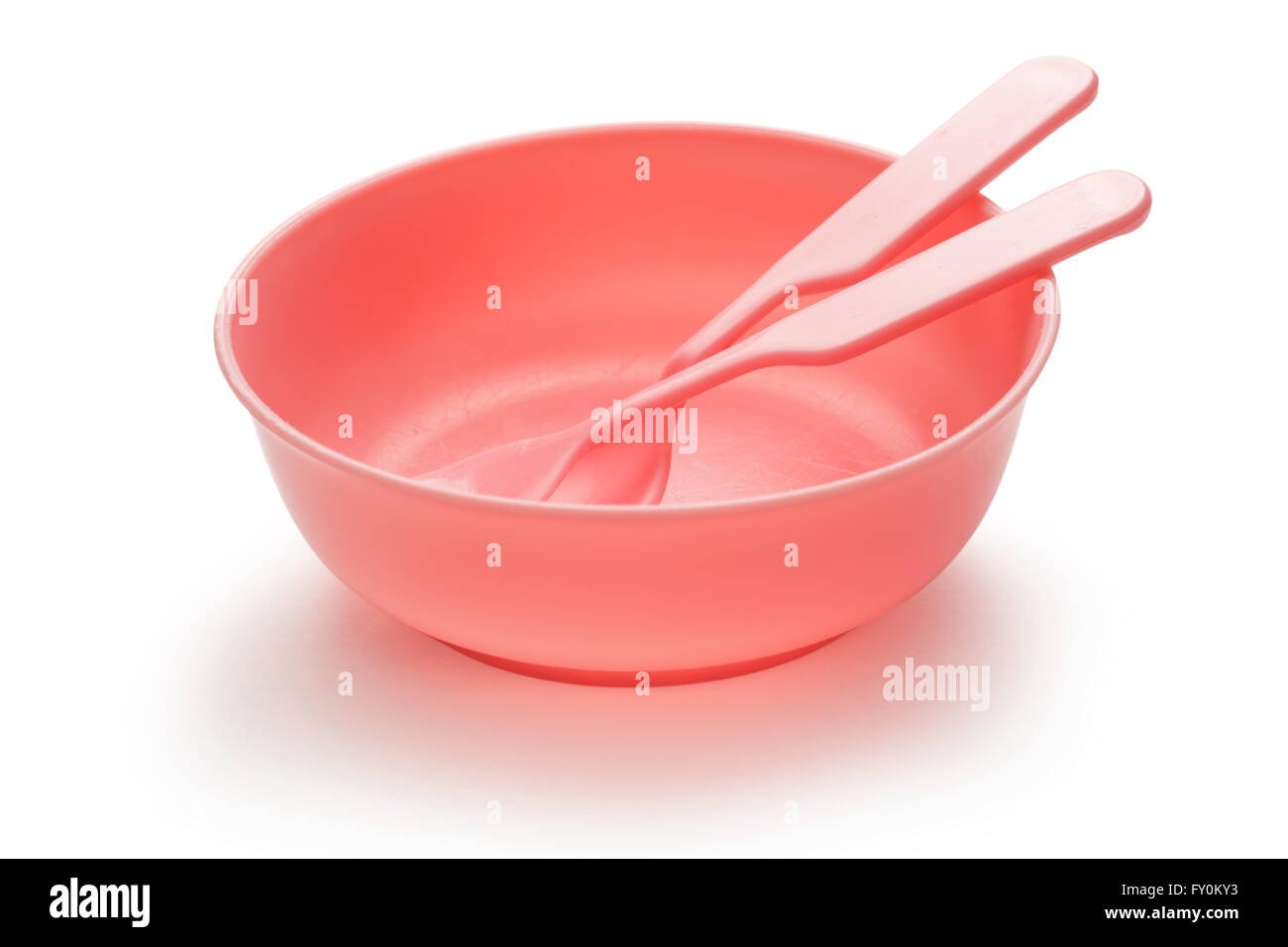 Rosa di stoviglie di plastica piatto, il cucchiaio e forchetta Foto Stock