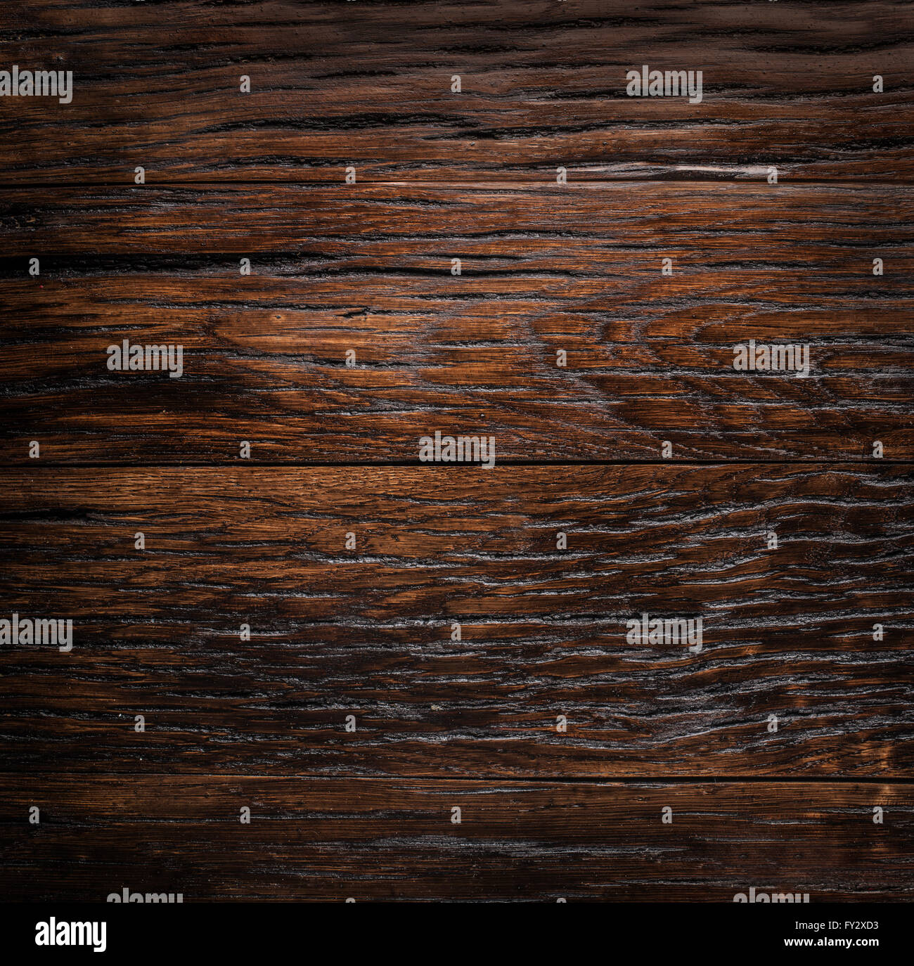 Sfondo di legno verniciato in colore marrone scuro. Foto Stock