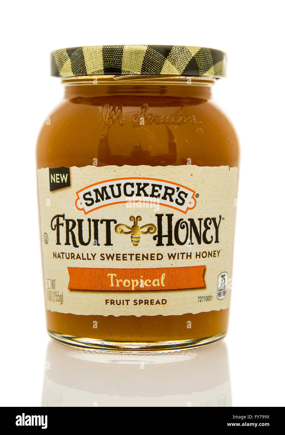 Winneconne, WI - 10 Feb 2016: Bottiglia di Smuckers nuovi frutti miele nel sapore tropicale. Foto Stock