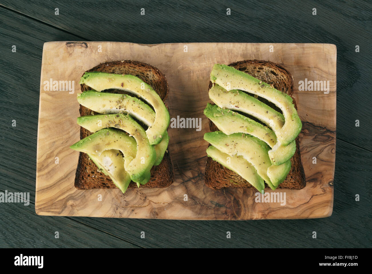 Aprire panini con avocado e spezie Foto Stock