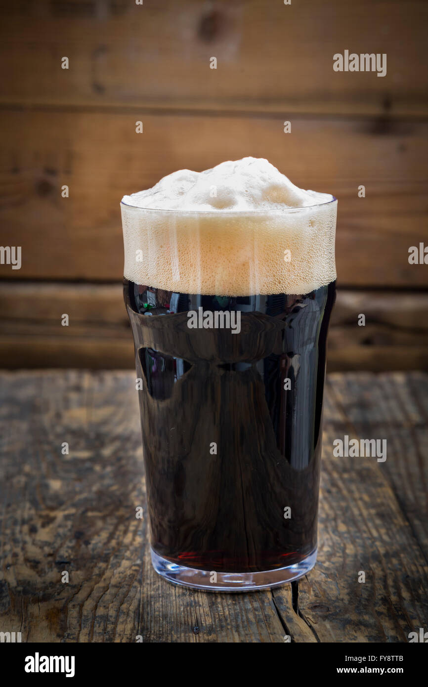 Stout pinta di birra in vetro Foto Stock