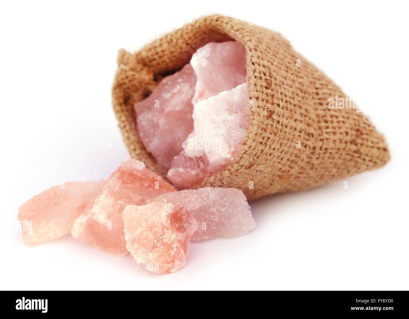 Saindhava lavana o Rosa himalayano sale di roccia su sfondo bianco Foto Stock