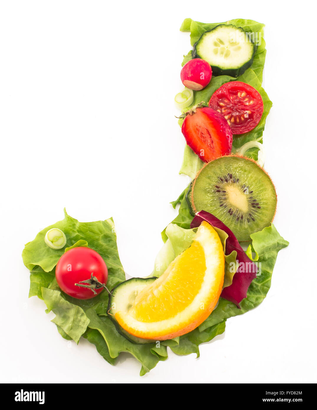 La lettera J fatta di insalate e frutta. Foto Stock