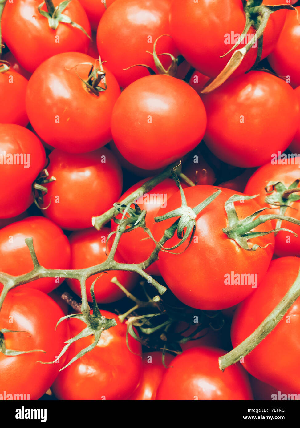 Sfondo con freschi pomodori rossi nel mercato. Foto Stock