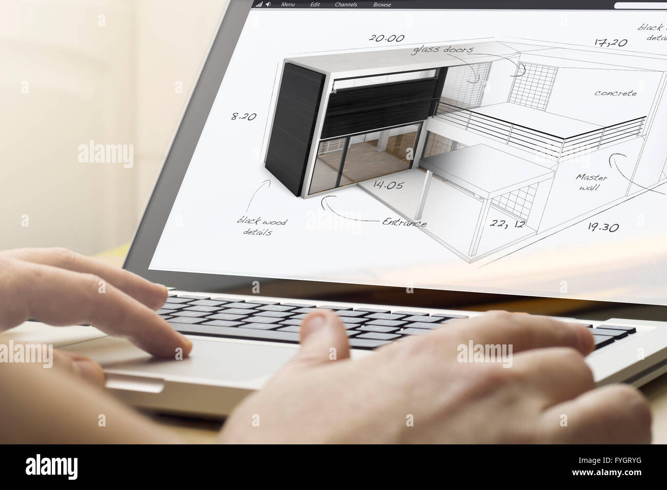 Concetto di architettura: un uomo che sta utilizzando un computer portatile con progetto di casa sullo schermo. Grafici dello schermo sono costituiti. Foto Stock