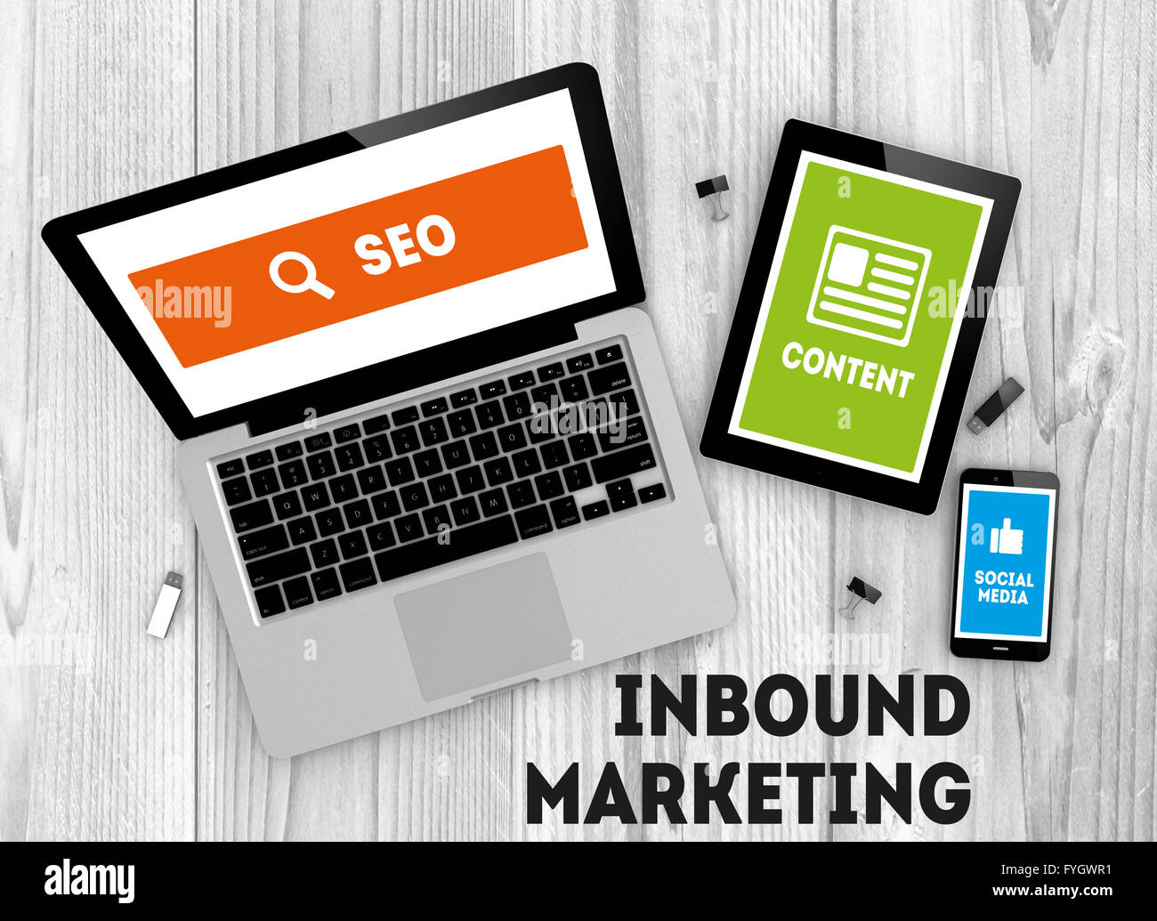 Il concetto di business: Dispositivi witn Marketing in entrata gli elementi sullo schermo. Tutti i grafici sono fatti. Foto Stock