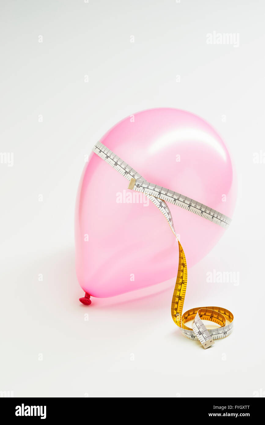 Palloncino con nastro di misurazione dell'obesità Foto Stock