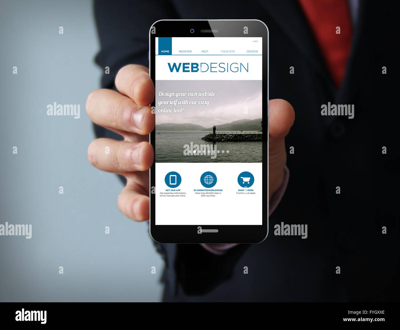Mobili di design concept: imprenditore mano che tiene un 3d generati toccare telefono con design web site sullo schermo. Schermo una grafica Foto Stock