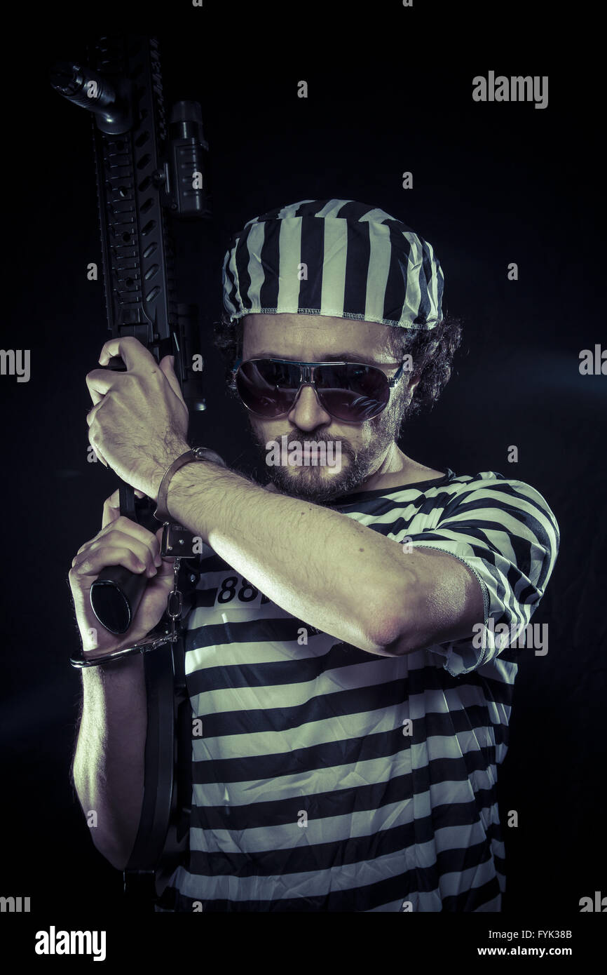 La rivolta, detenuto in una prigione con una mitragliatrice Foto Stock