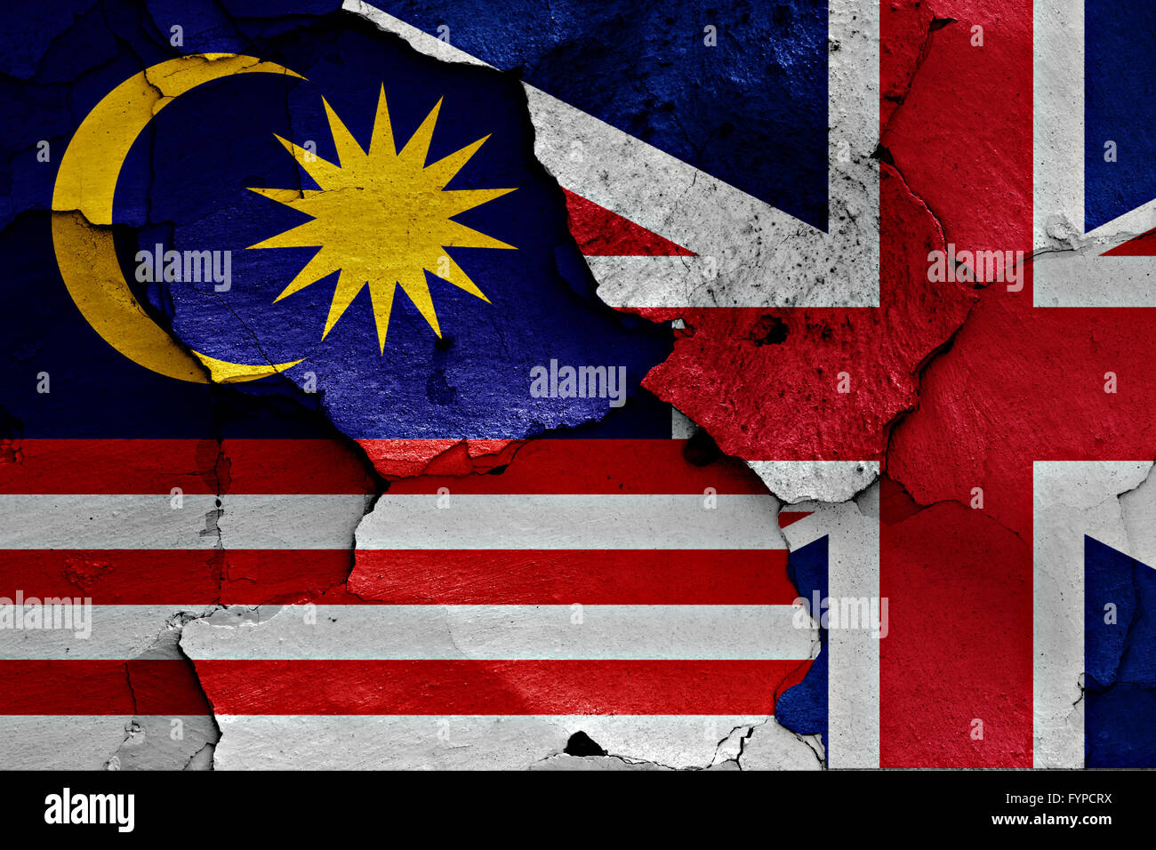 Bandiere di Malaysia e UK dipinta sulla parete incrinato Foto Stock