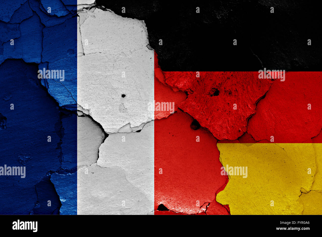 Bandiere di Francia e Germania dipinta su incrinato wal Foto Stock