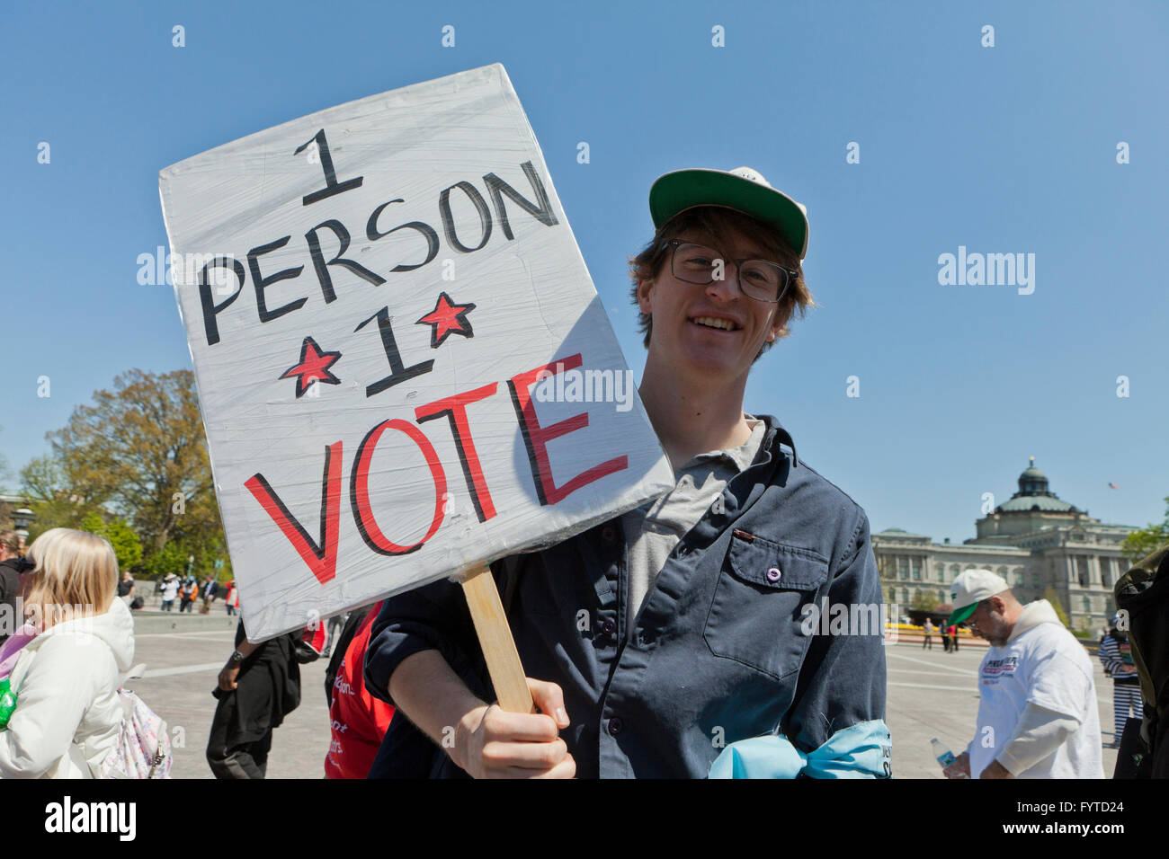 Manifestante liberale con 1 persona 1 voto segno - Washington DC, Stati Uniti d'America Foto Stock