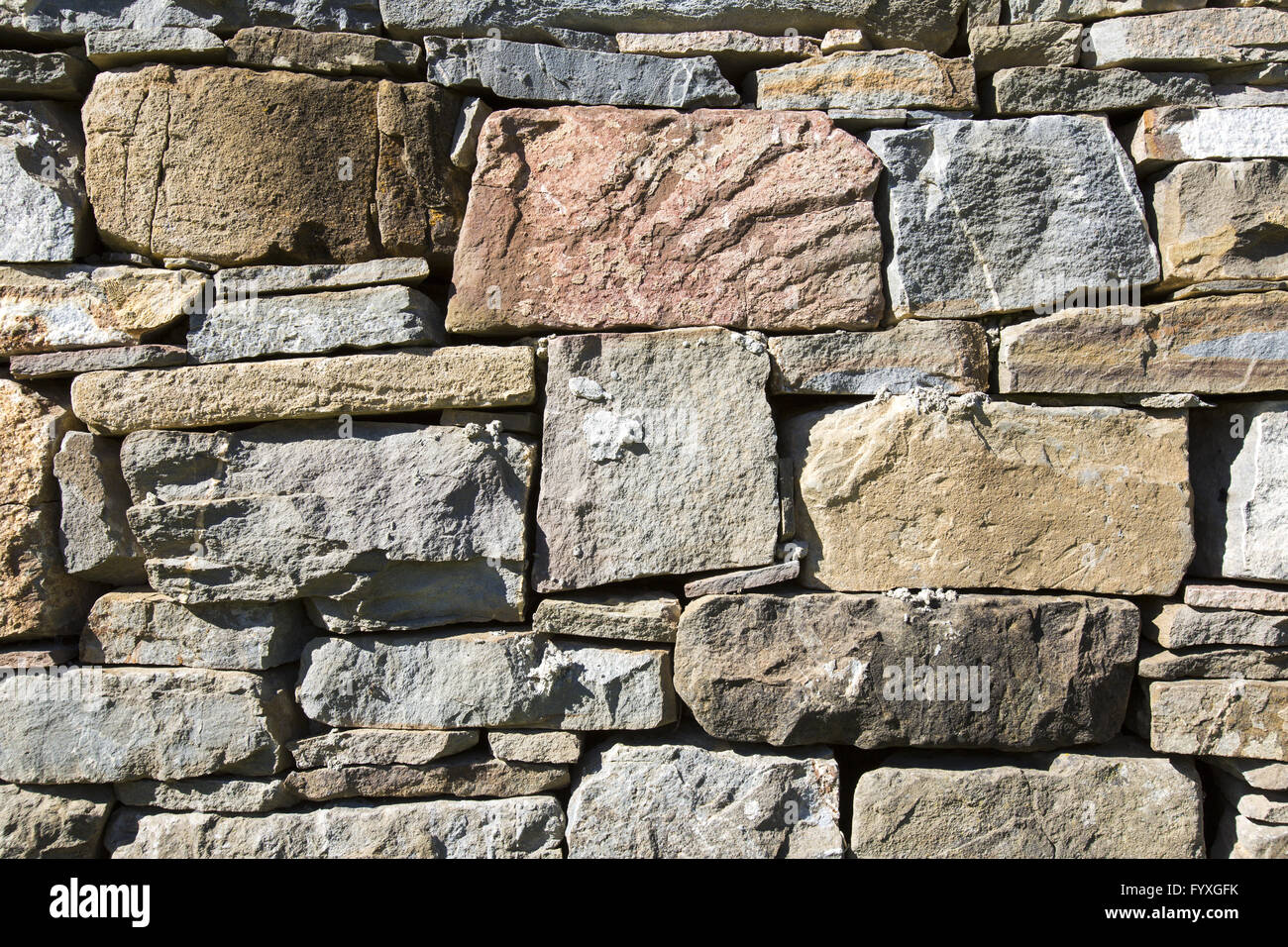 Muratura muro di pietra Foto Stock