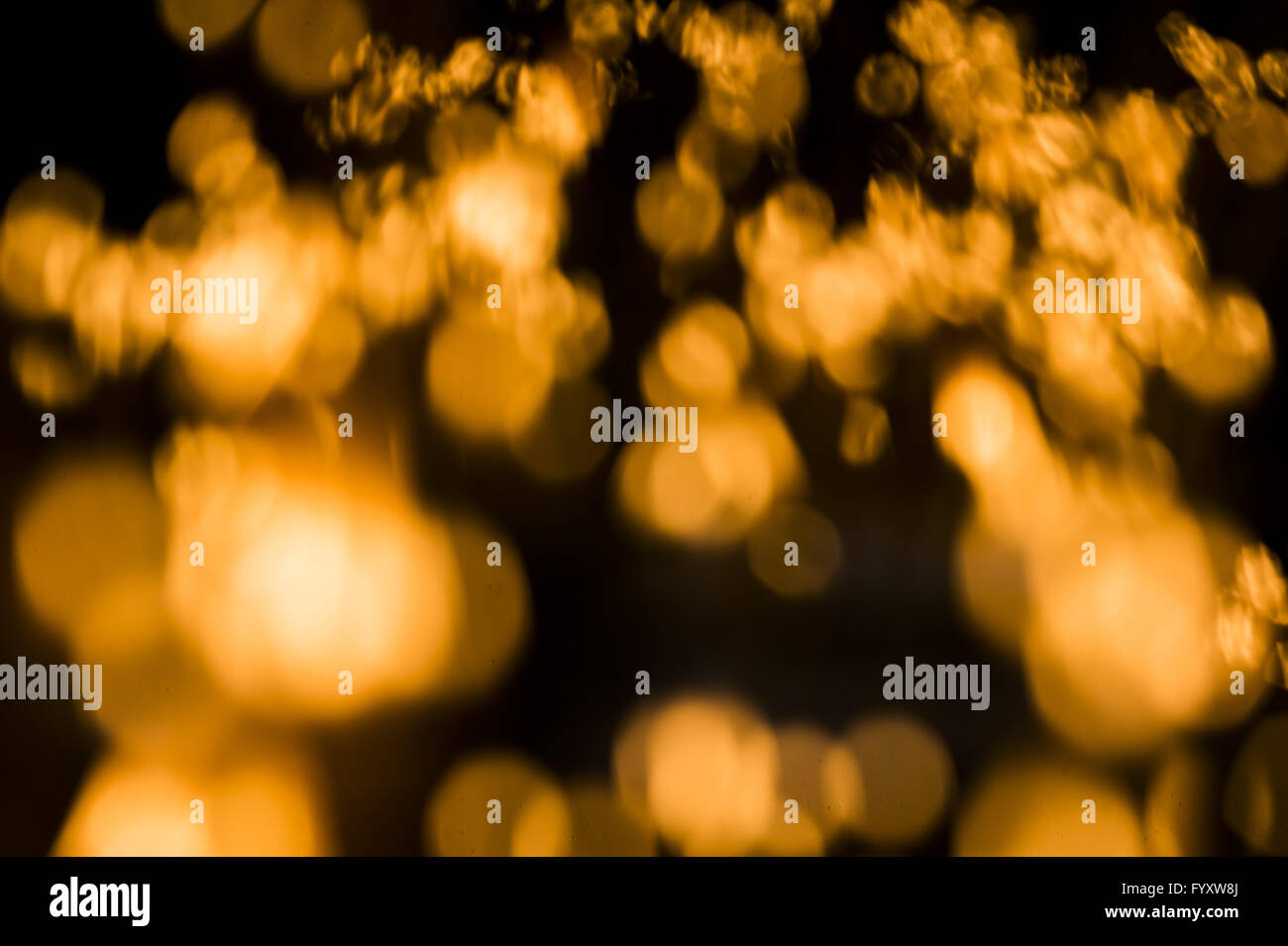 Luci di candela blured antincendio Foto Stock