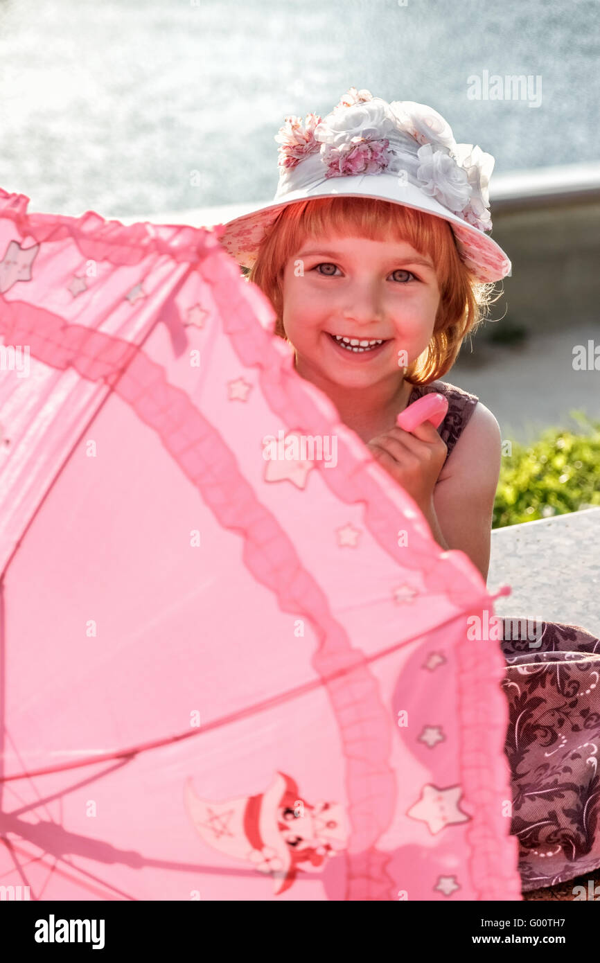 La ragazza con l'ombrello. Foto Stock