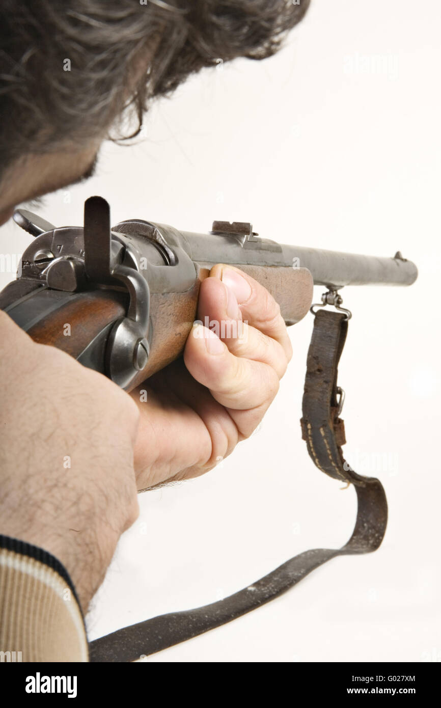 uomo con la pistola Foto Stock