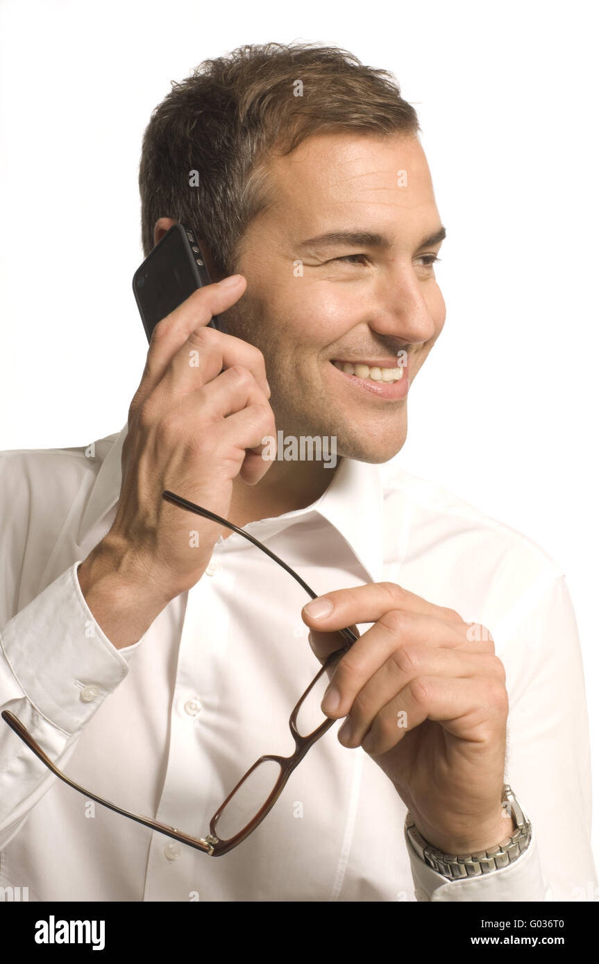 Uomo con il telefono cellulare Foto Stock