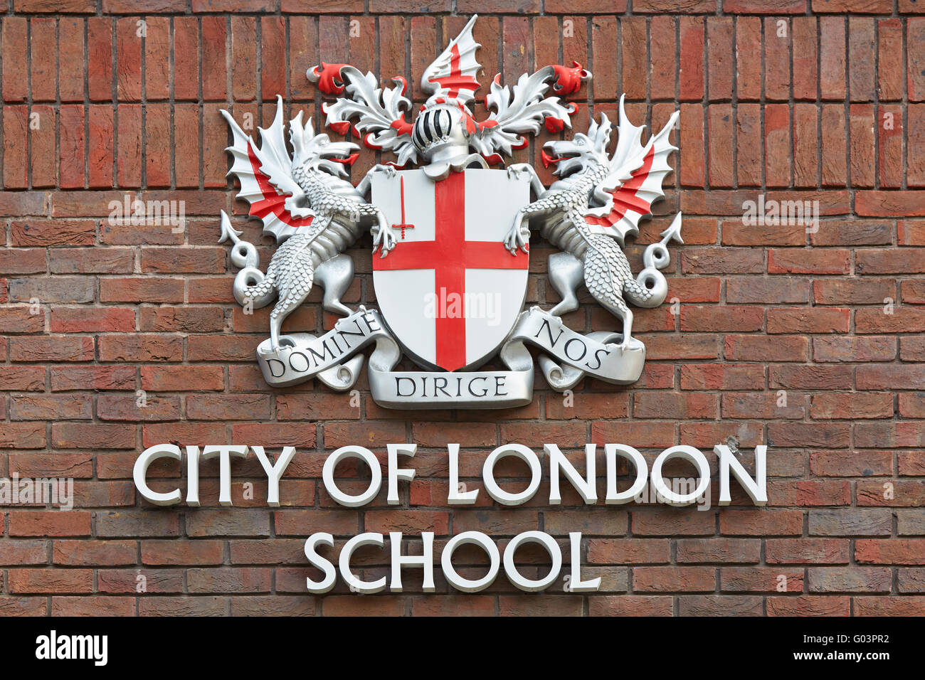 City of London School segno rosso sul muro in mattoni a Londra Foto Stock