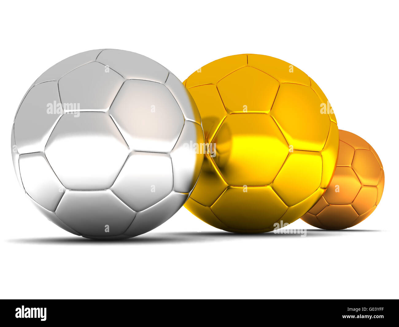 Argento, oro e bronzo palloni da calcio sul retro bianco Foto Stock