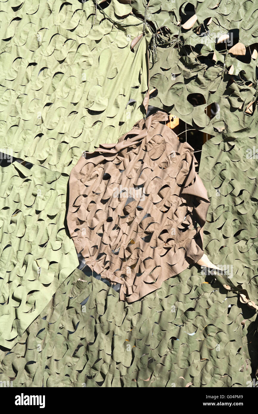 Concetto militare. Sfondo costituito dall esercito tessile di mimetizzazione Foto Stock
