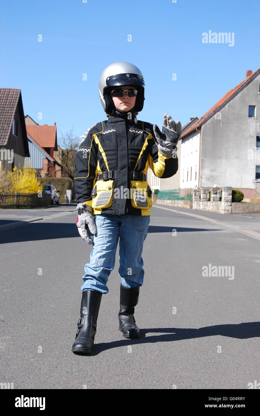 Piccolo motociclista Foto Stock