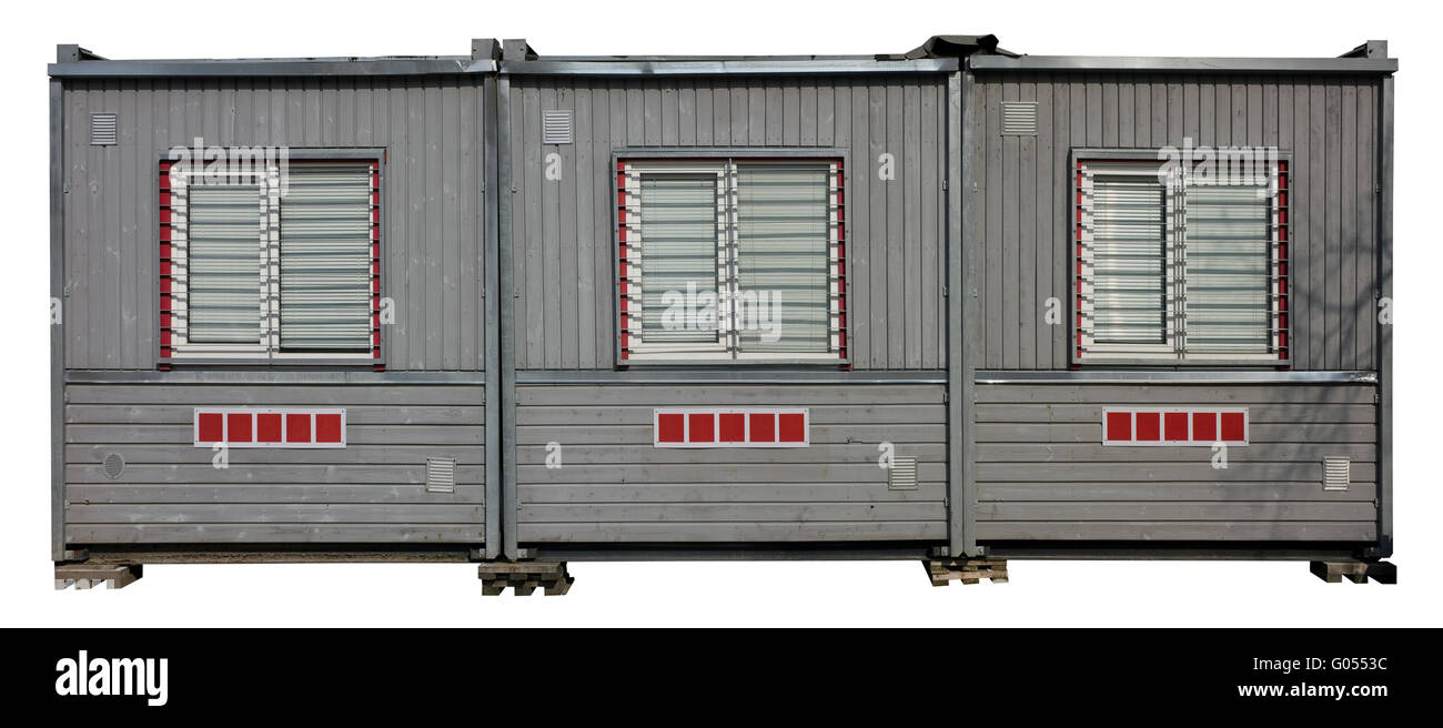 Il capannone temporanea dei costruttori è costituito da tre sezioni. I blocchi sono dipinti con vernice di colore grigio e non vi sono finestre con persiane. Foto Stock