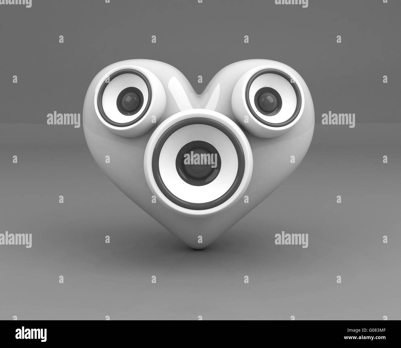 Cuore bianco con altoparlanti su sfondo grigio Foto Stock