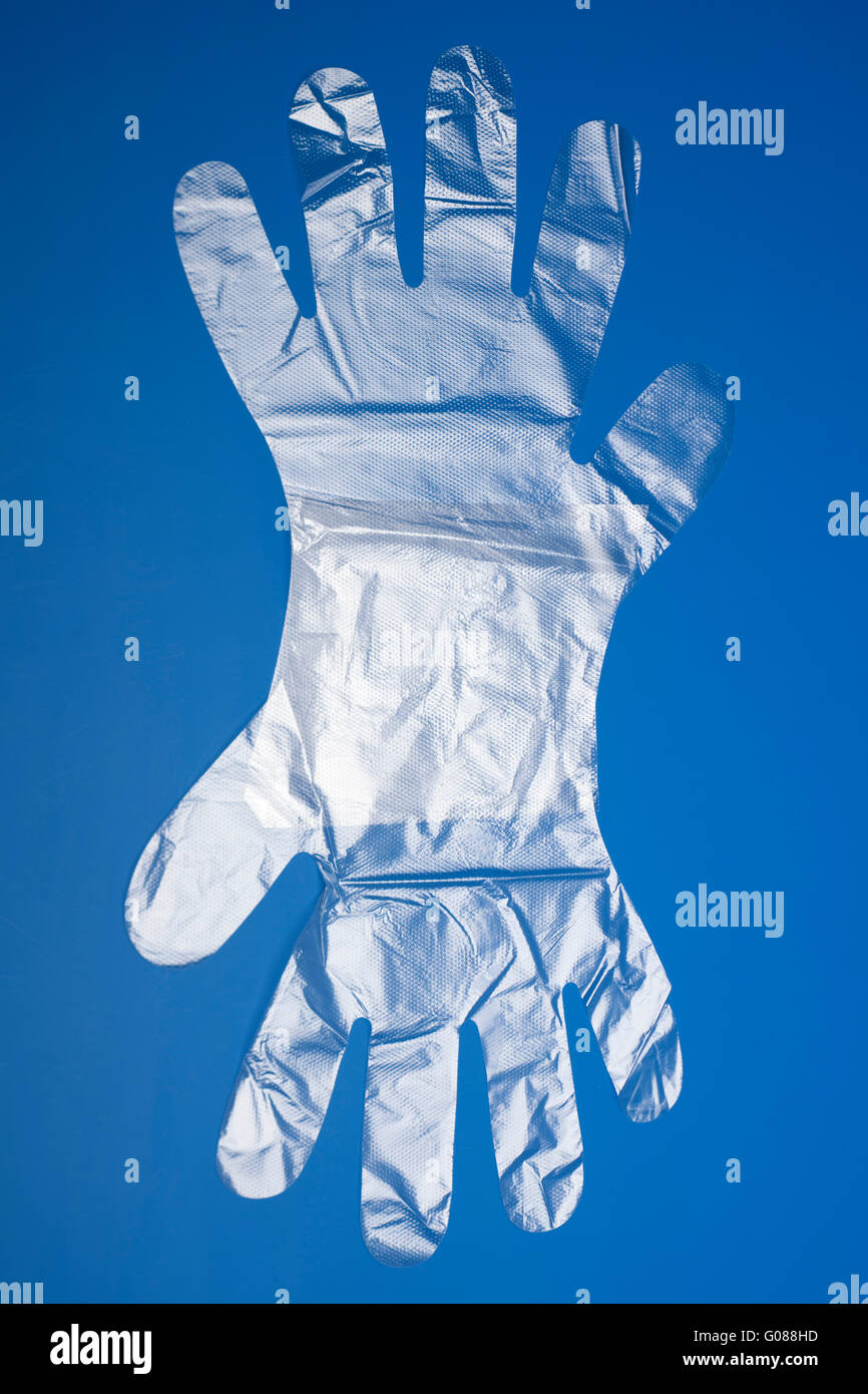 Coppia di una dimensione di politene guanti usa e getta Foto stock - Alamy