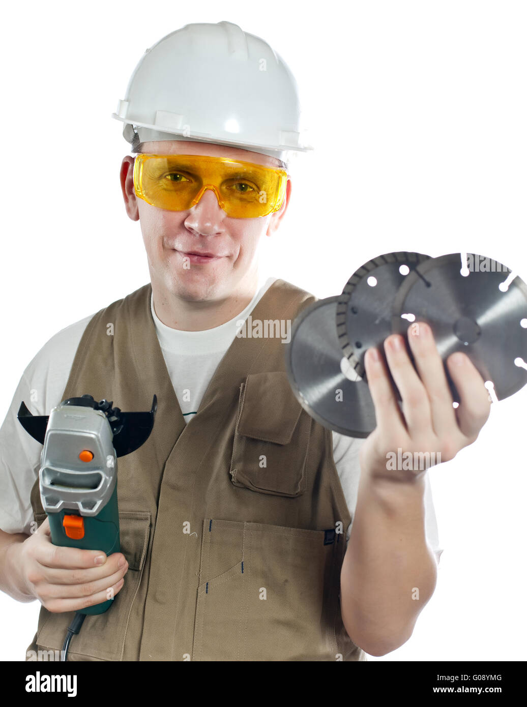 Uomo in tute da lavoro in occhiali e un casco w Foto Stock