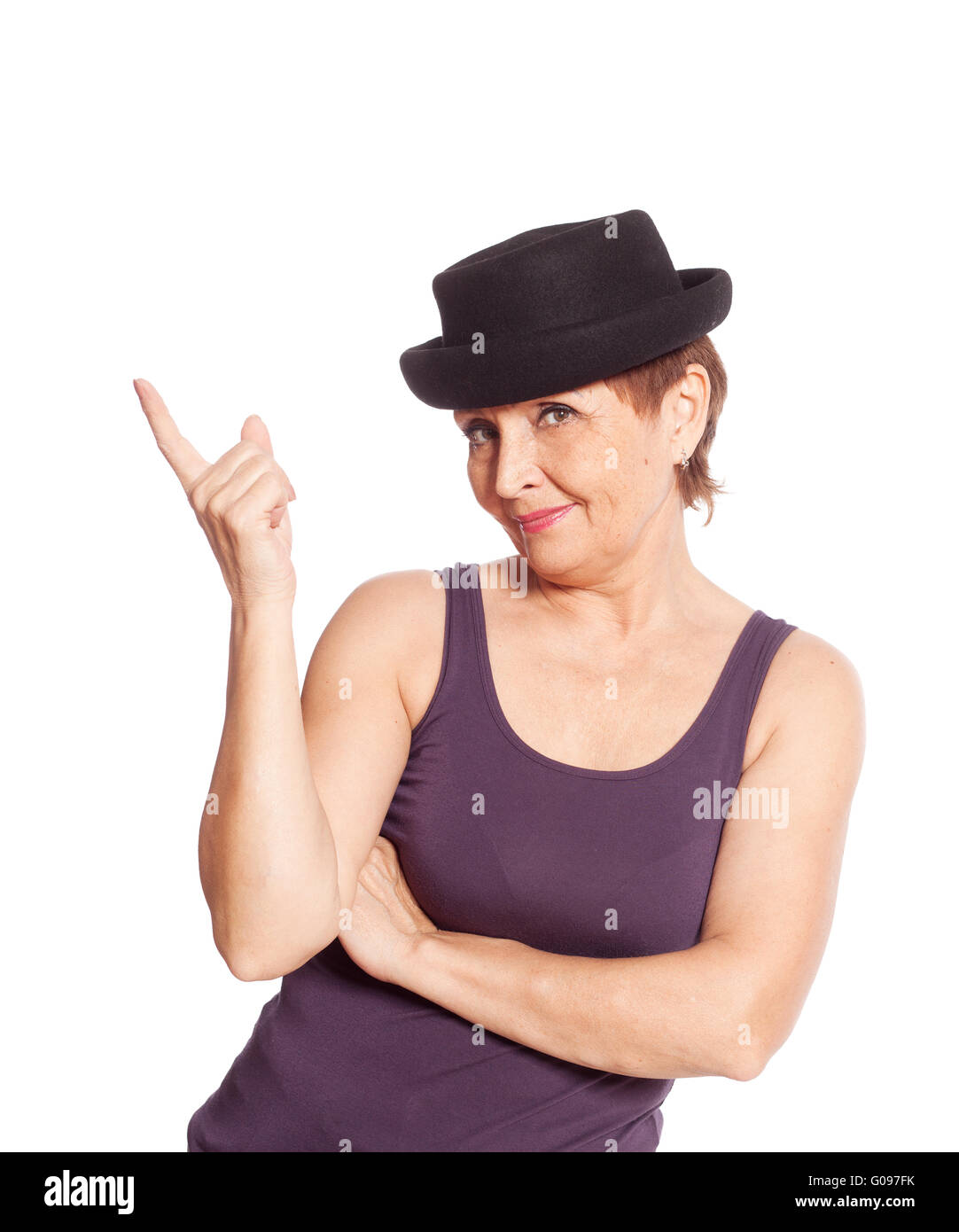 Donna attraente 50 anni in un cappello nero sorridente Foto Stock