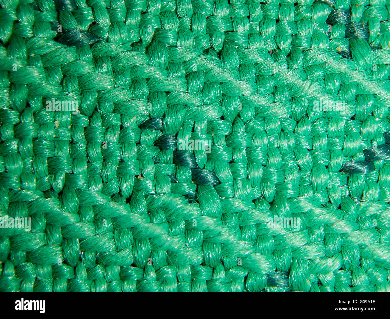 Macro di verde tessitura tessitura. Foto Stock