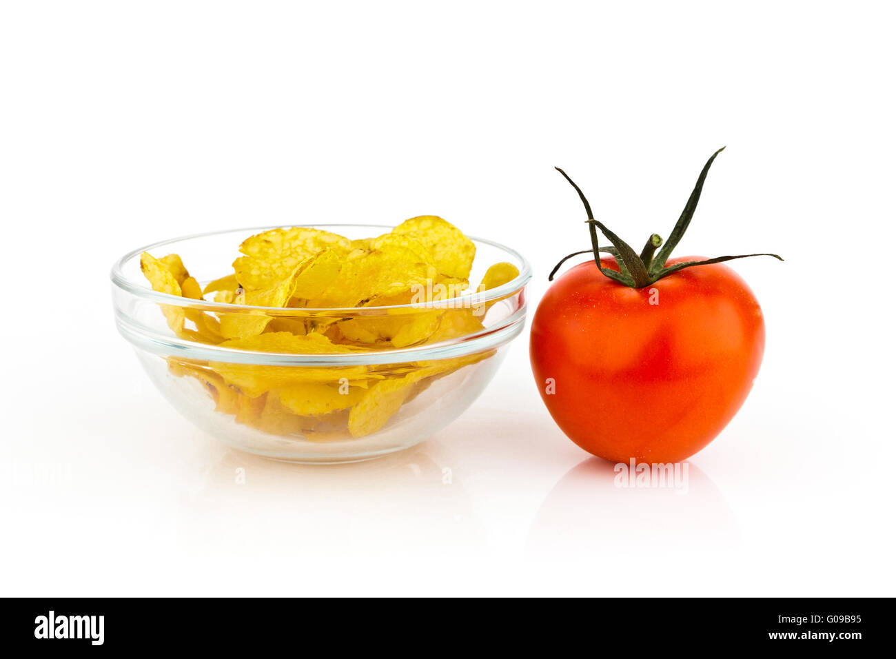 Patate fritte con pomodoro. Foto Stock