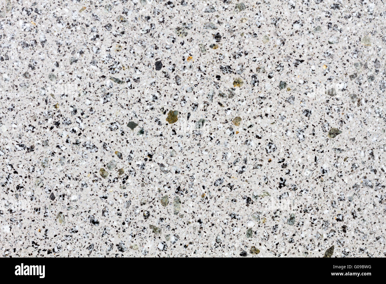 Bianco scintillante struttura in granito su una pietra lavorata Foto Stock