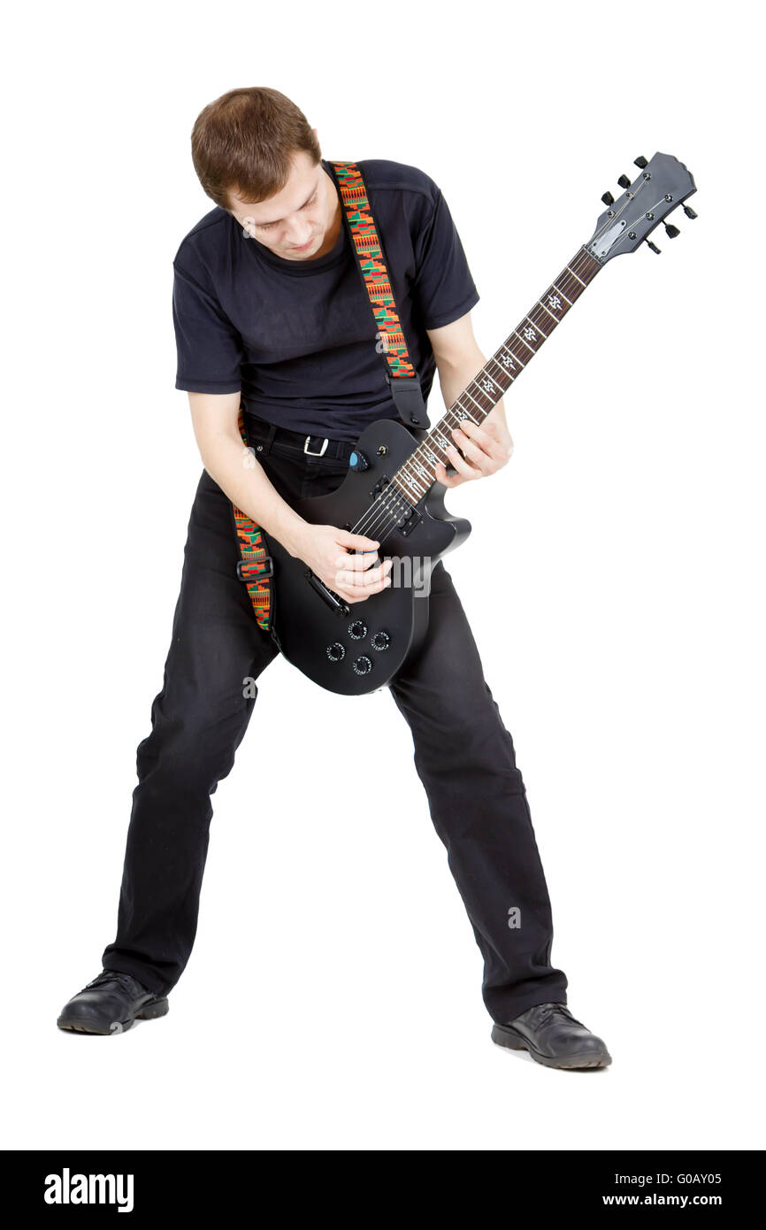 Uomo su uno sfondo bianco. Giocatore con una chitarra elettrica Foto Stock