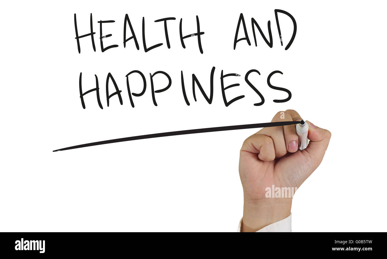 Motivazionali di concetto di immagine di una mano che tiene pennarello e scrivere la salute e felicità isolato su bianco Foto Stock
