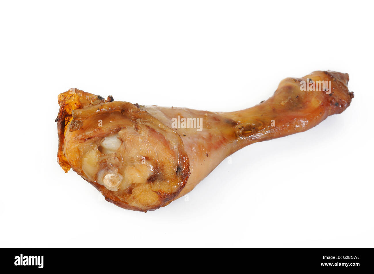 Il pollo al forno coscia su sfondo bianco Foto Stock