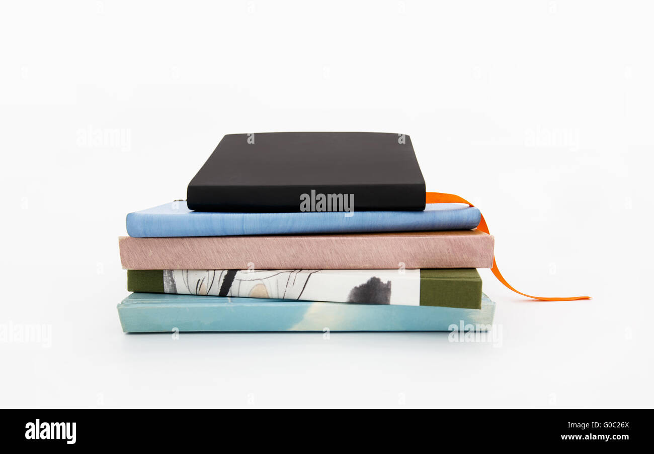 4 libri impilati Foto Stock