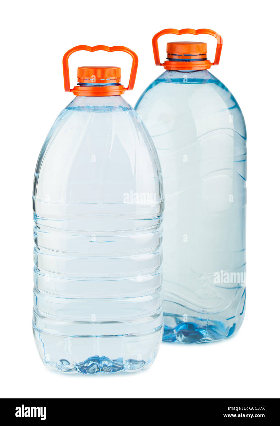 Due grandi di plastica le bottiglie di acqua con i cappucci arancioni Foto Stock
