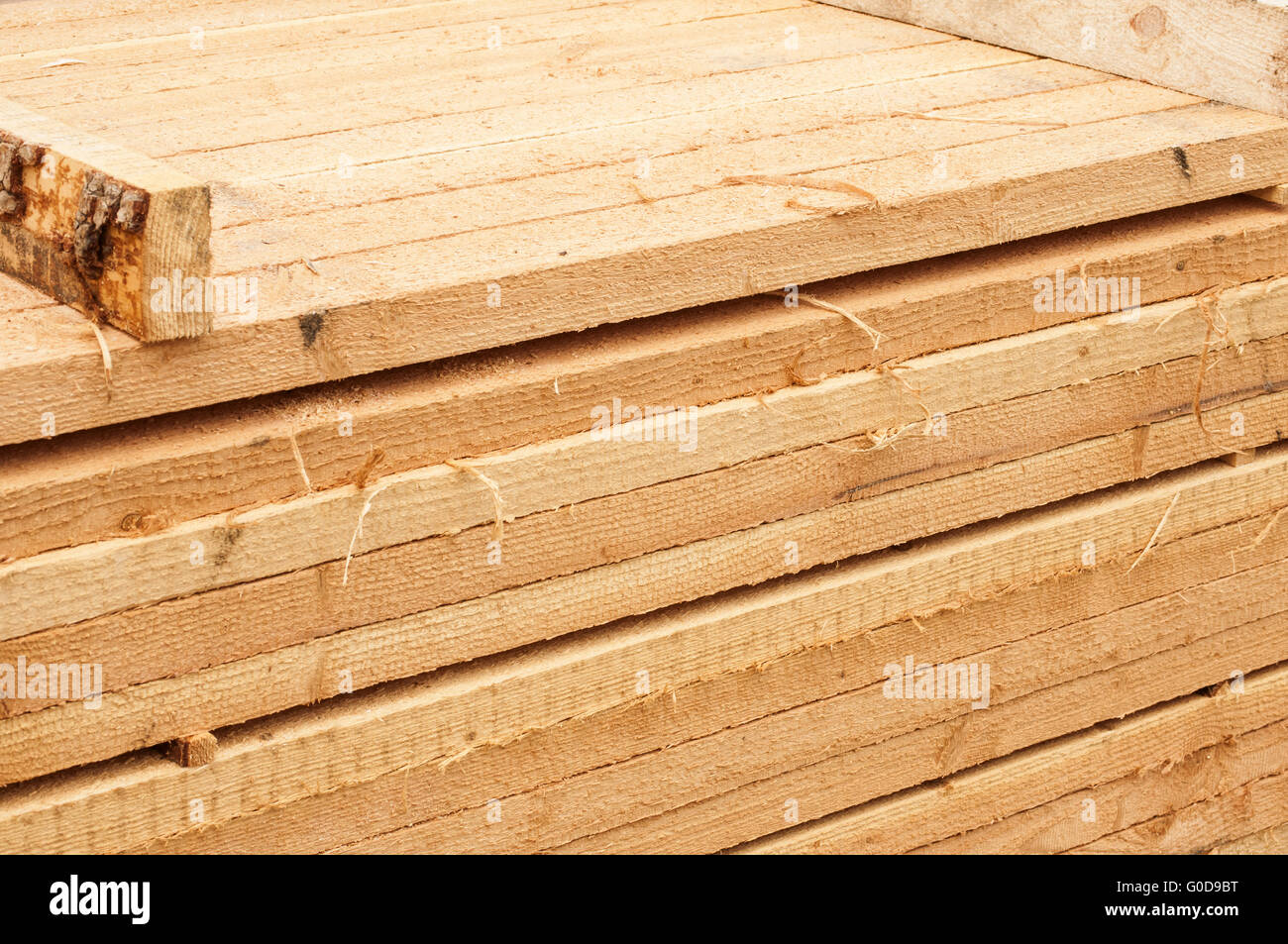 Tagliato in tavole e rivestimento in vendita materiale legnoso Foto Stock