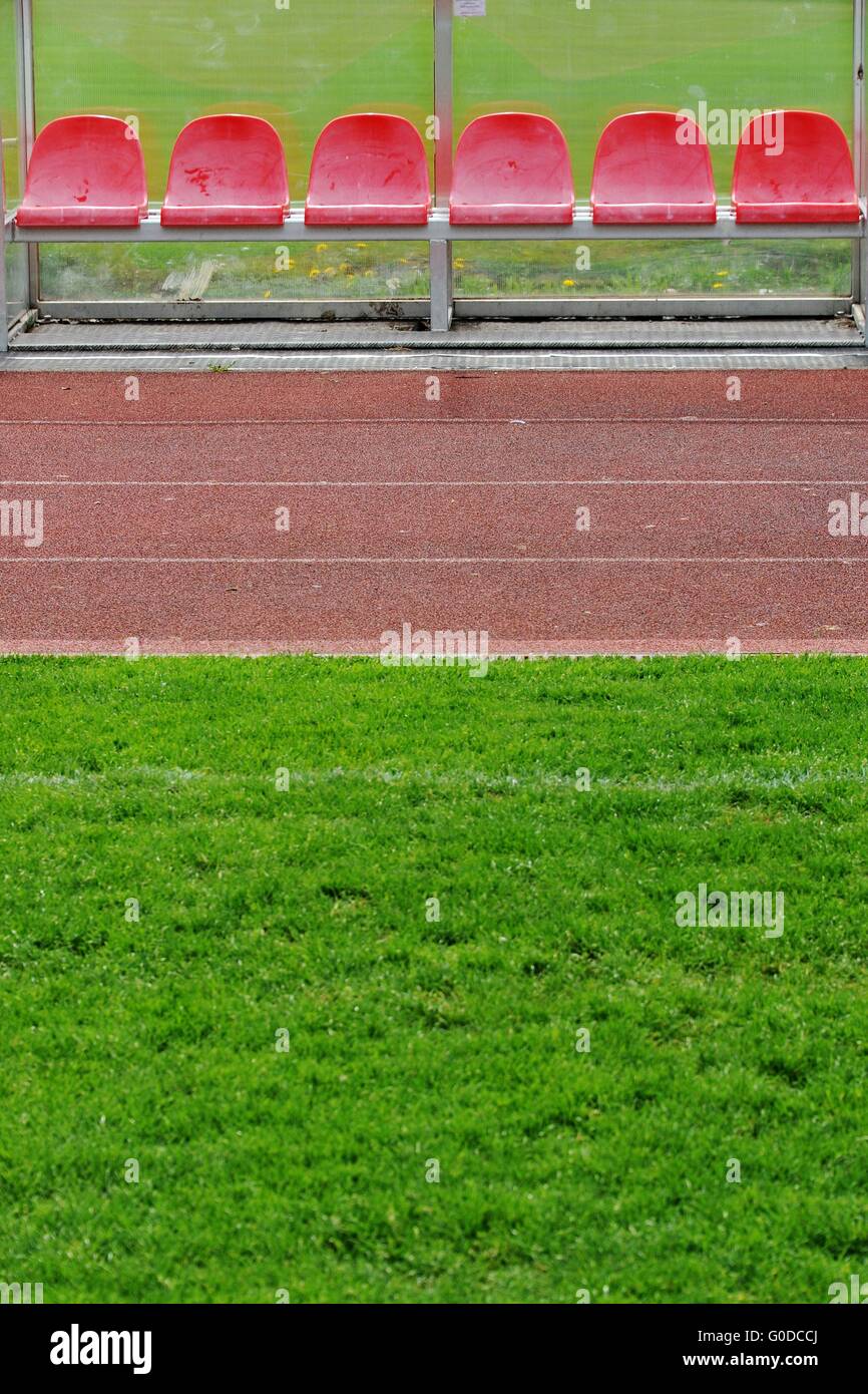 Posti a sedere su un footballground Foto Stock
