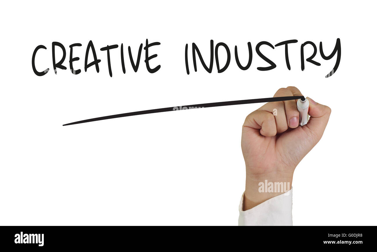 Il concetto di Business immagine di una mano che tiene pennarello e scrivere industria creativa isolato su bianco Foto Stock