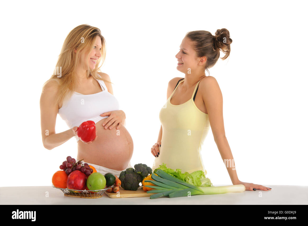 Due amiche gay con frutta e verdura Foto Stock