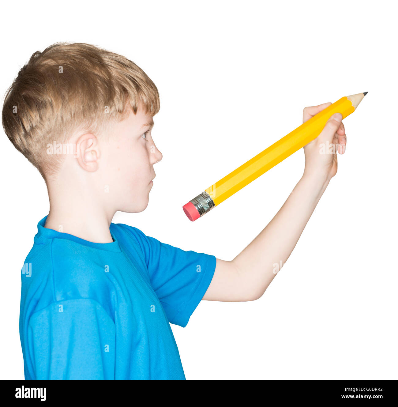Bambino con una matita in mano Foto stock - Alamy