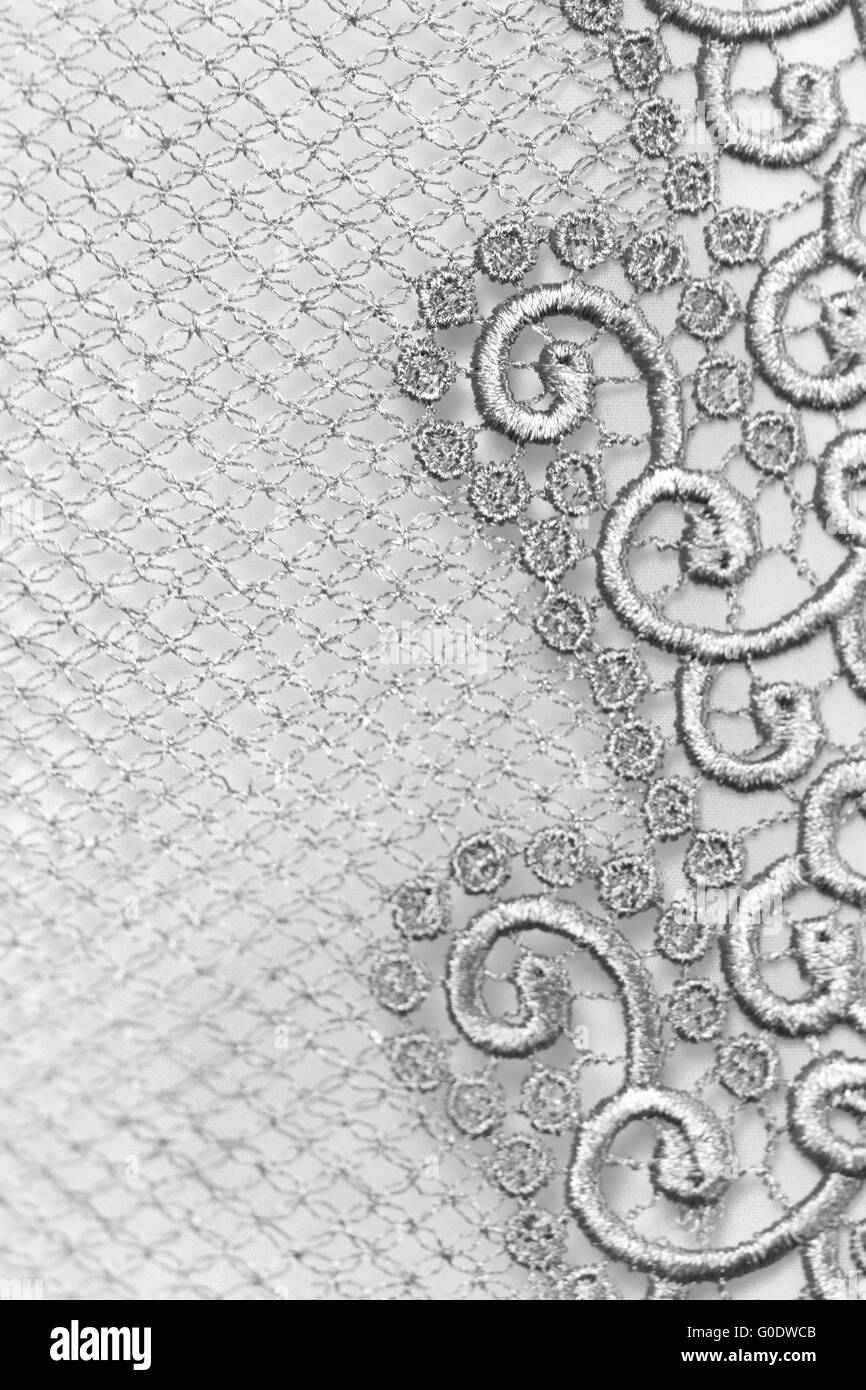 Argento decorativo pizzo isolate su sfondo bianco Foto Stock