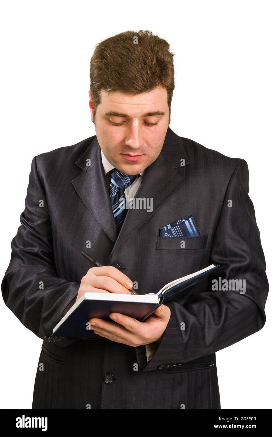 Imprenditore tenendo una penna Foto Stock