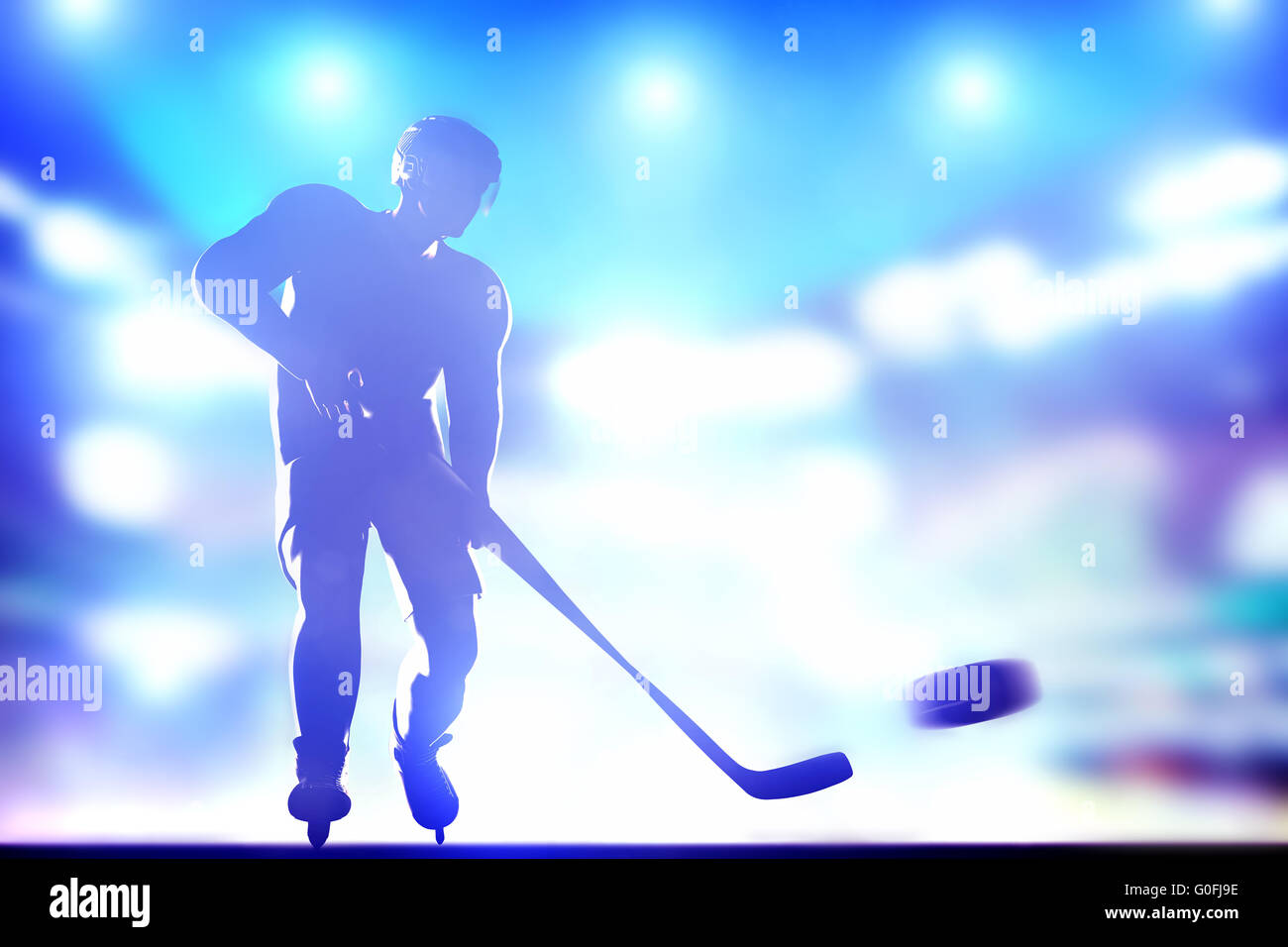 Giocatore di Hockey ripresa sul traguardo in piena arena luci notturne Foto Stock
